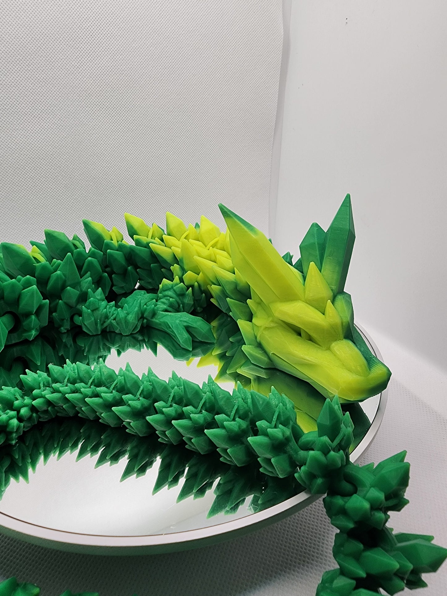3D printed articulated heat color changing Crystal Dragon with custom wall mount.