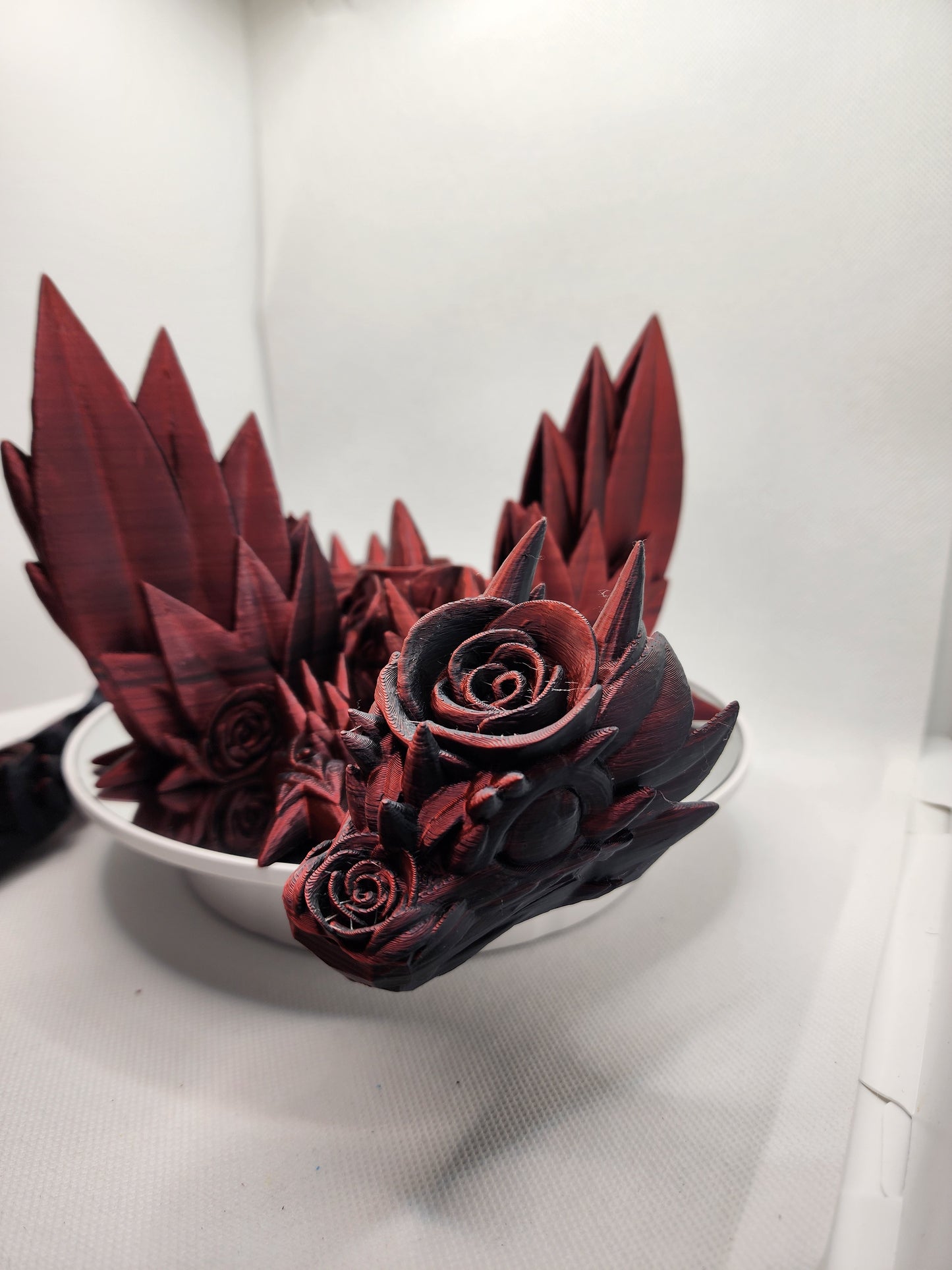 3D printed Rose Dragon with color matching wall mount.