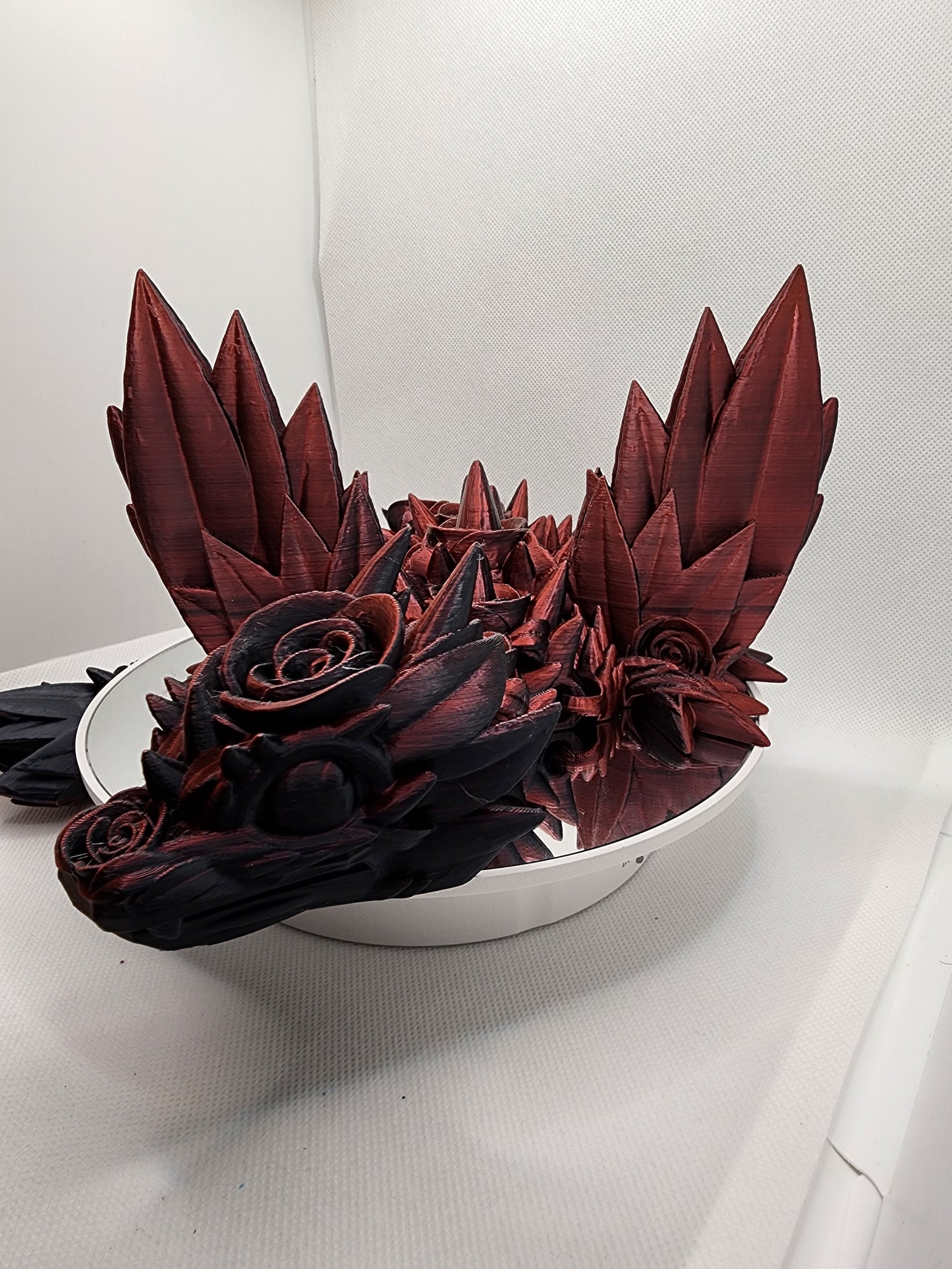 3D printed Rose Dragon with color matching wall mount.