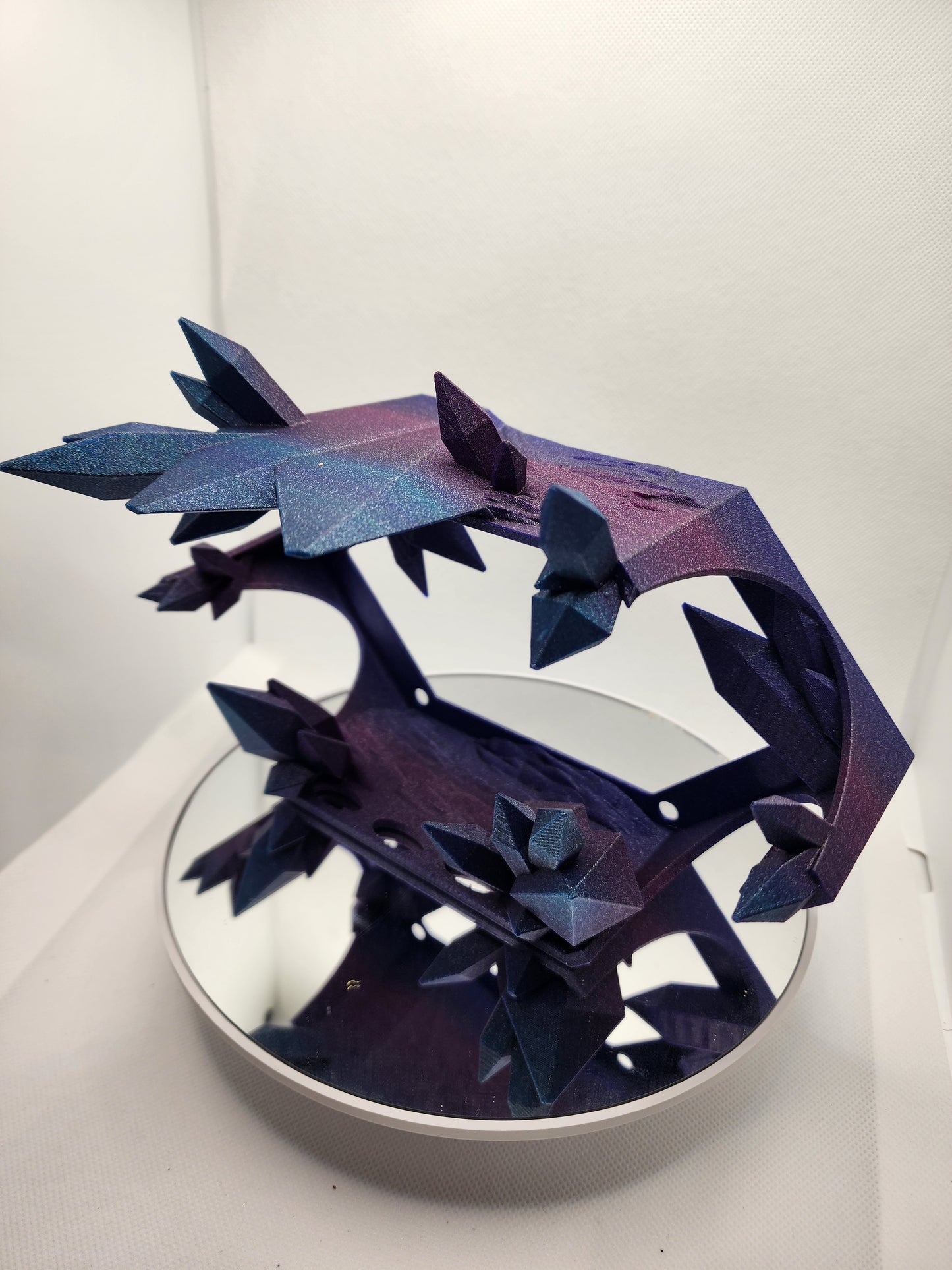 3D printed articulated extra long Rose Dragon with color matching wall mount.