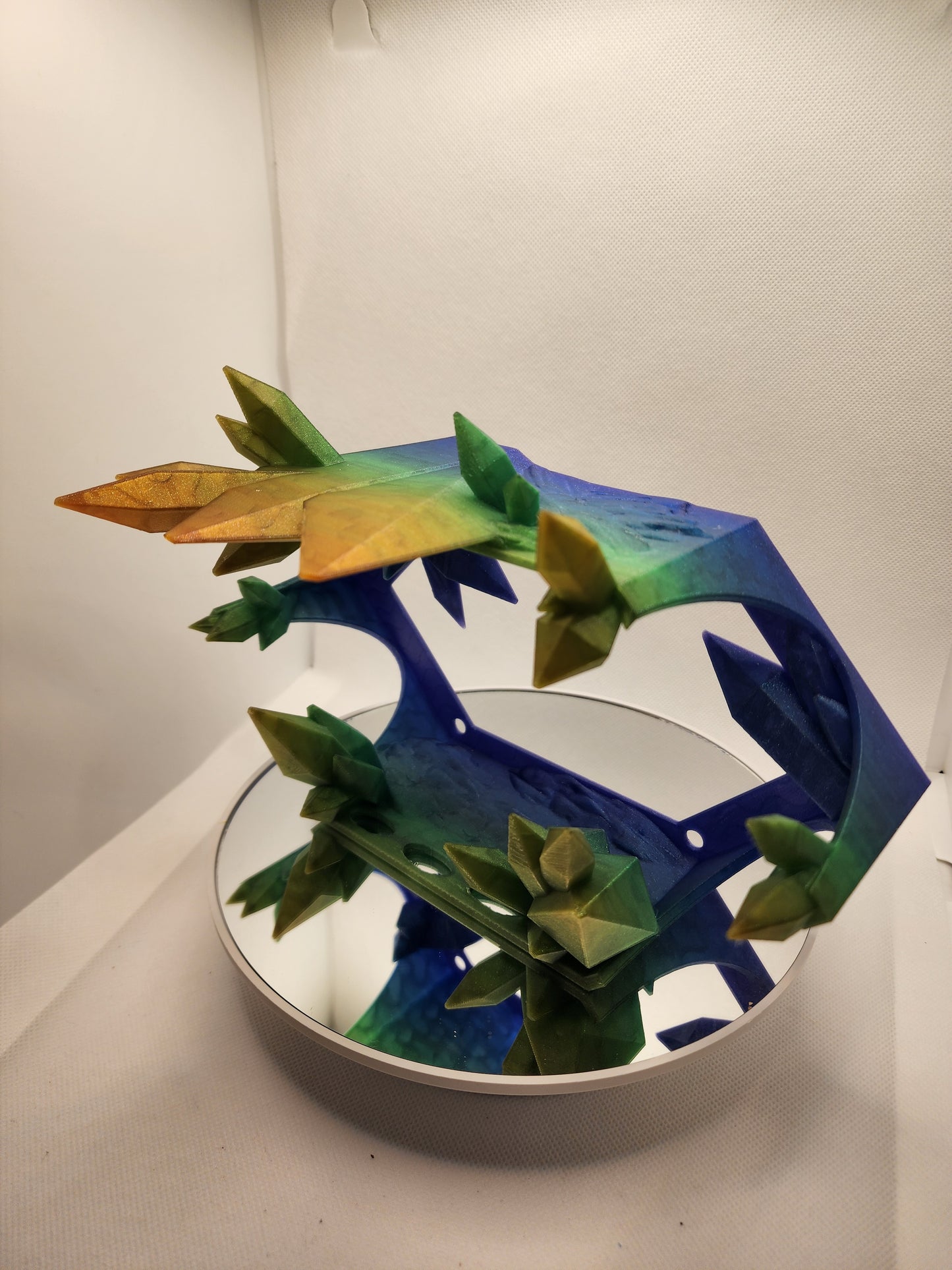 3D printed articulated heat color changing Crystal Dragon with custom wall mount.