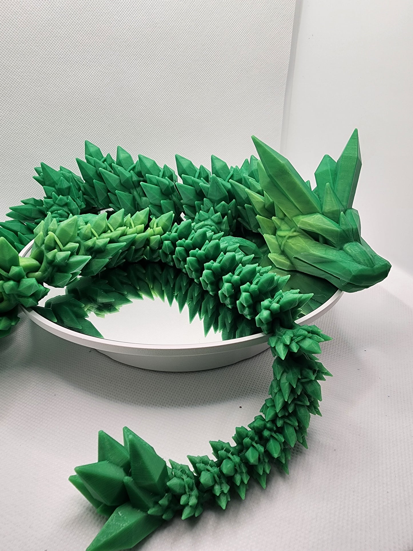 3D printed articulated heat color changing Crystal Dragon with custom wall mount.