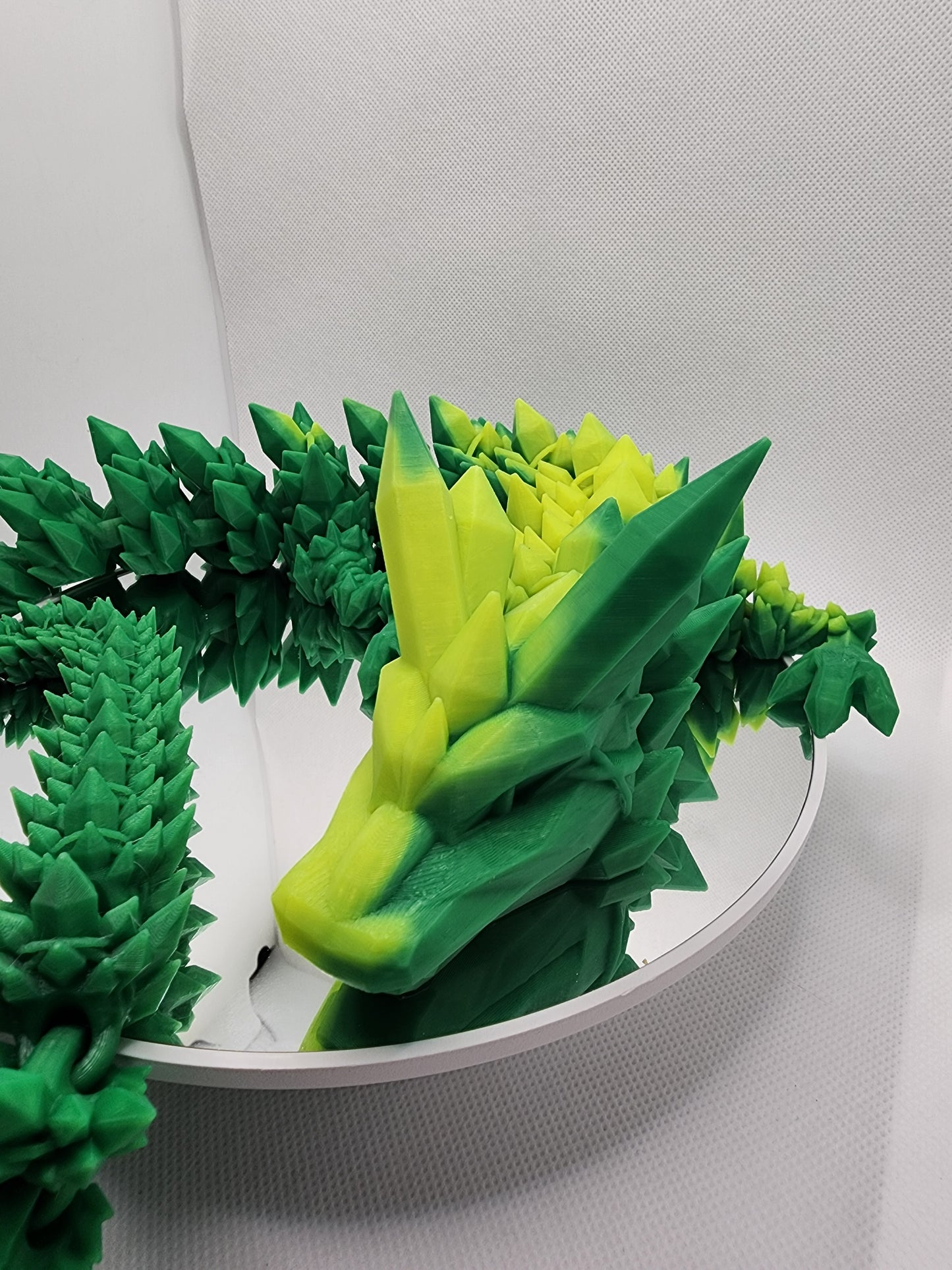 3D printed articulated heat color changing Crystal Dragon with custom wall mount.