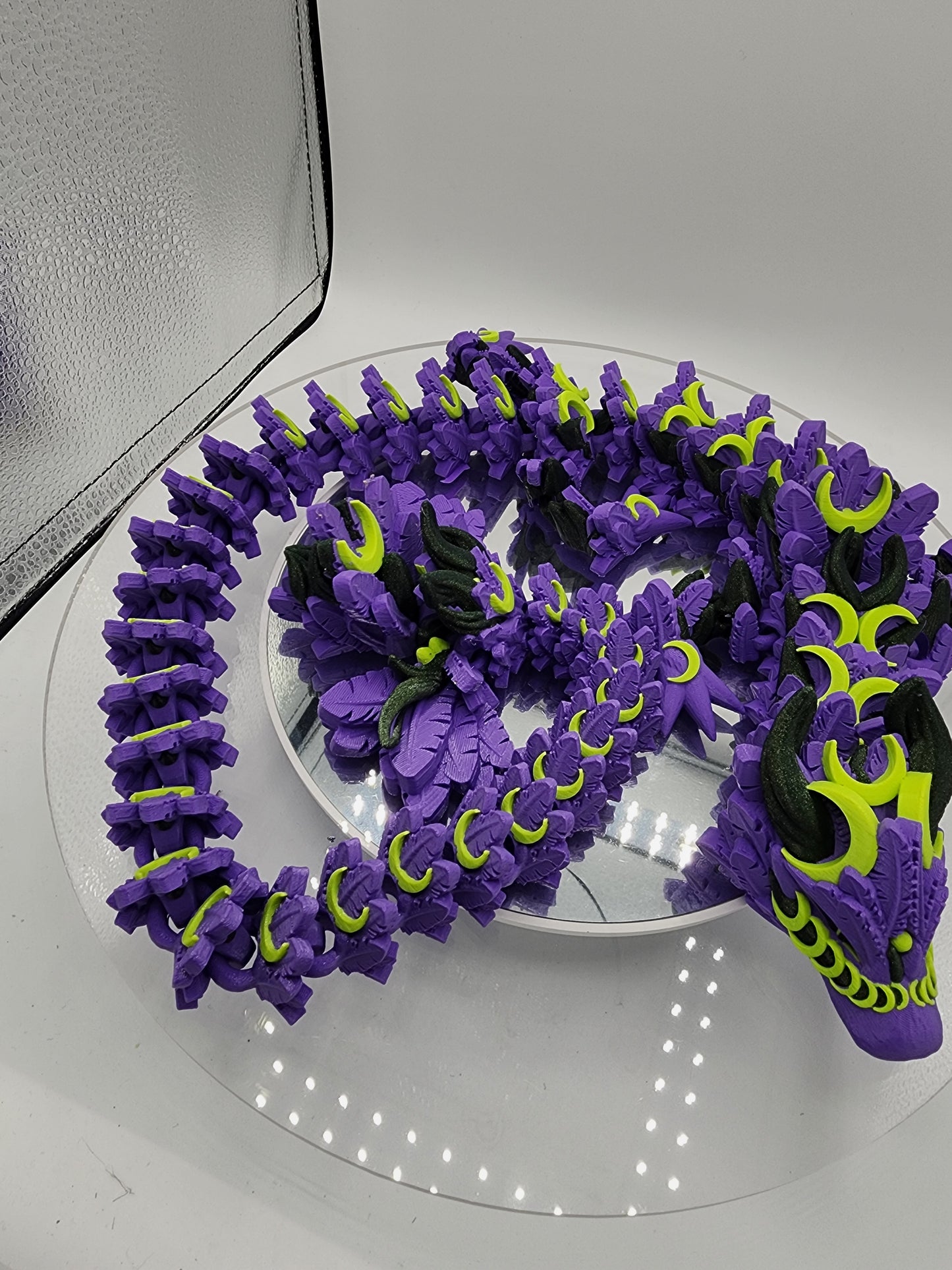 3D printed articulated Lunar Dragon with custom wall mount