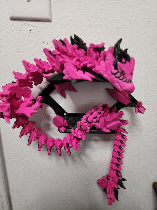 3D printed articulated Lunar Dragon with color-matching custom wall mount.