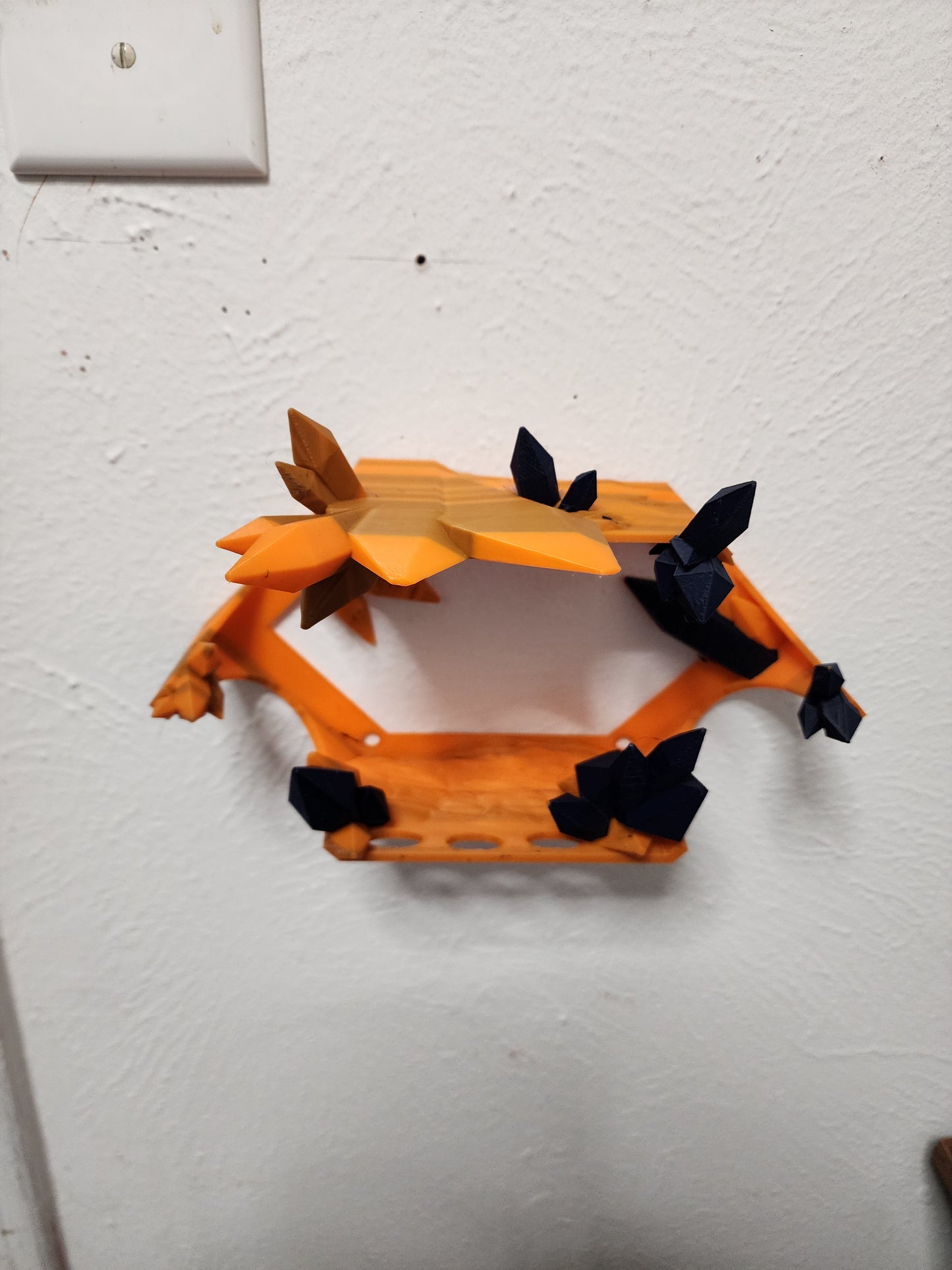 3D printed articulated Light Heart Dragon with custom color matching wall mount.