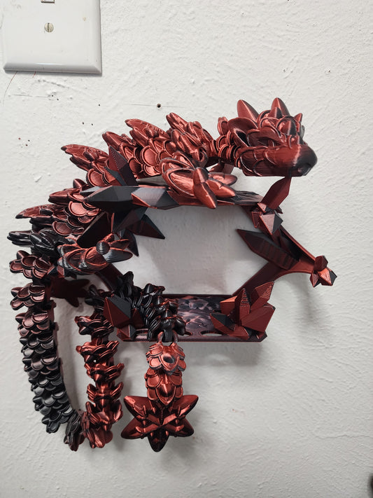 3D printed articulated color-changing Ginger Bread Dragon with wall mount.