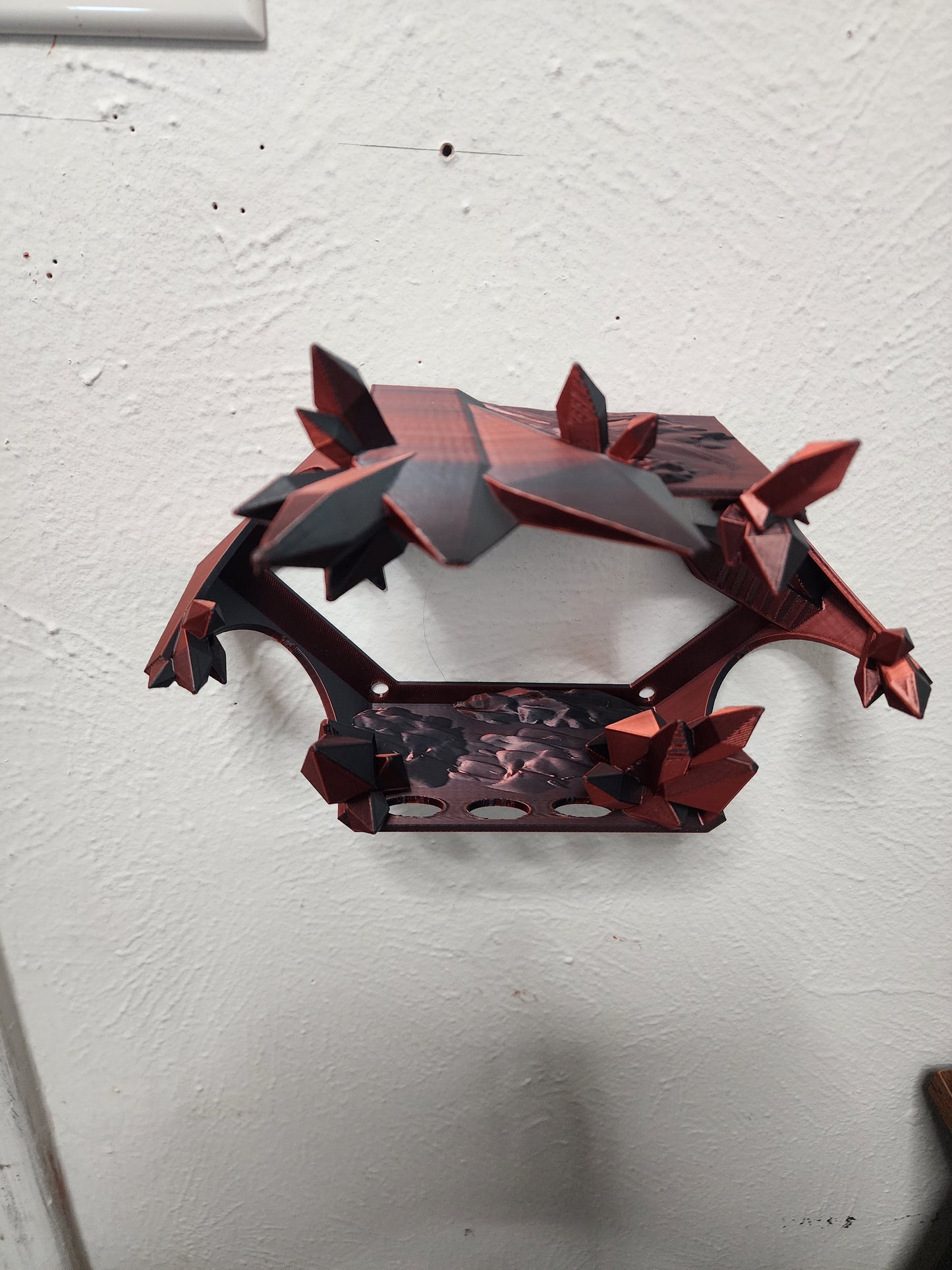 3D printed articulated color-changing Ginger Bread Dragon with wall mount.