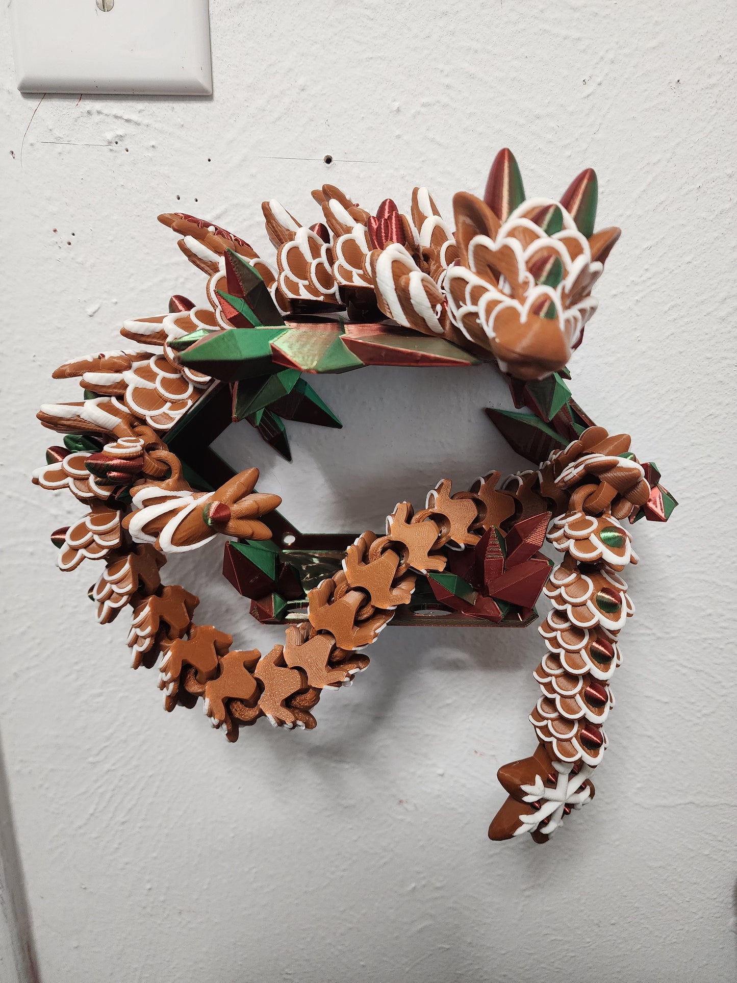 3D printed articulated Ginger Bread dragon with custom wall mount