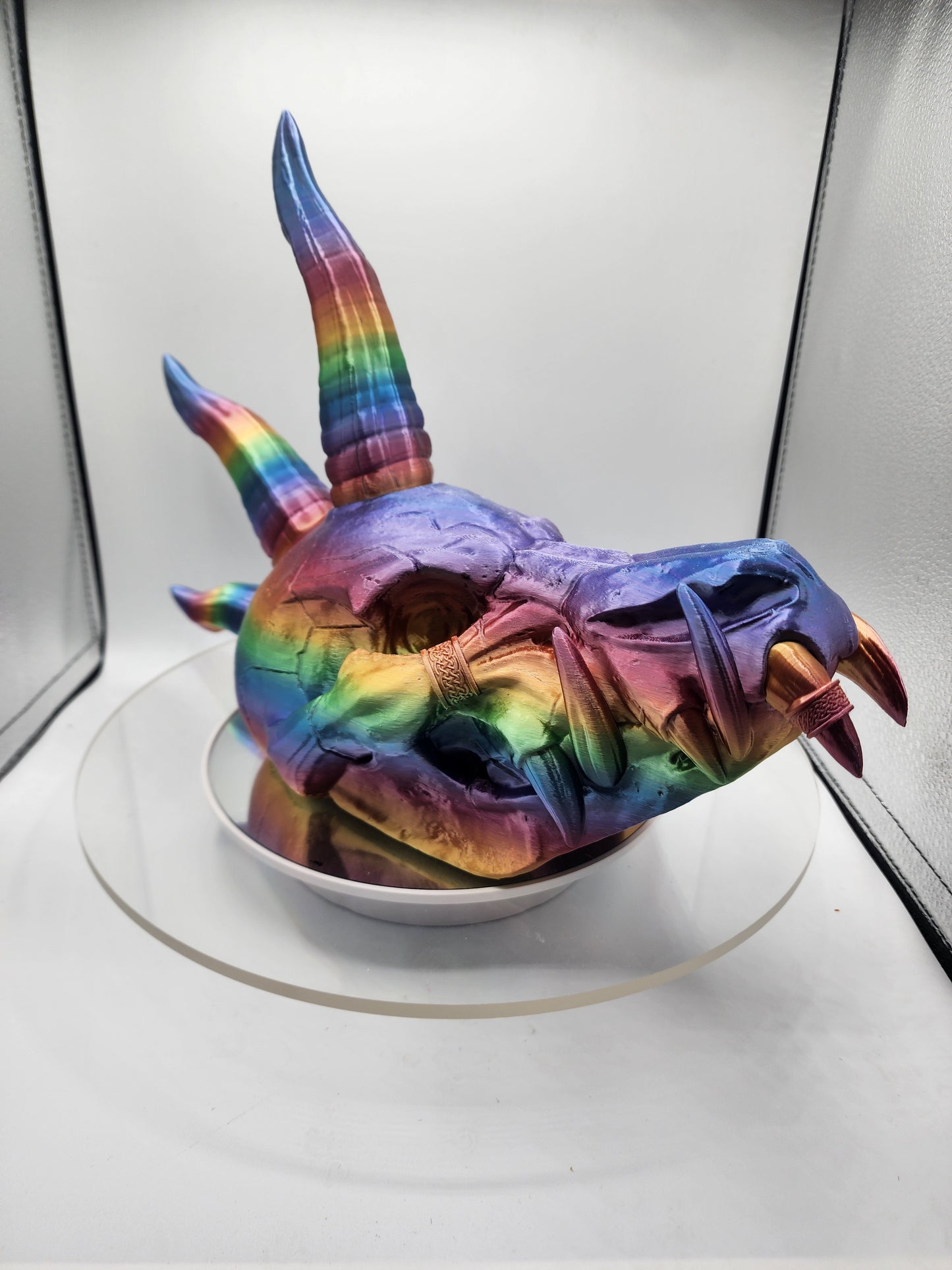 3D printed Dragon Skull printed in a rainbow filament.