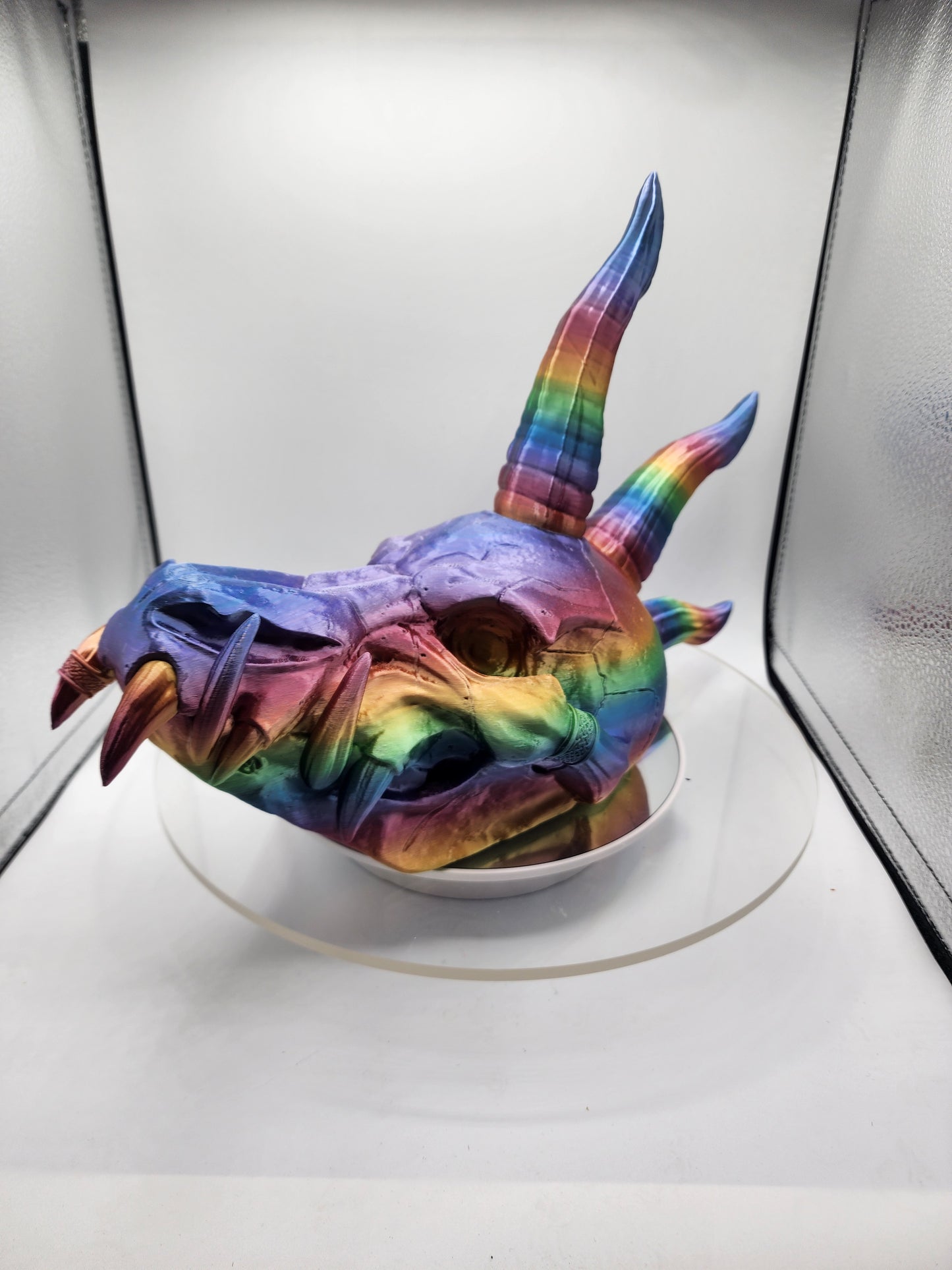 3D printed Dragon Skull printed in a rainbow filament.