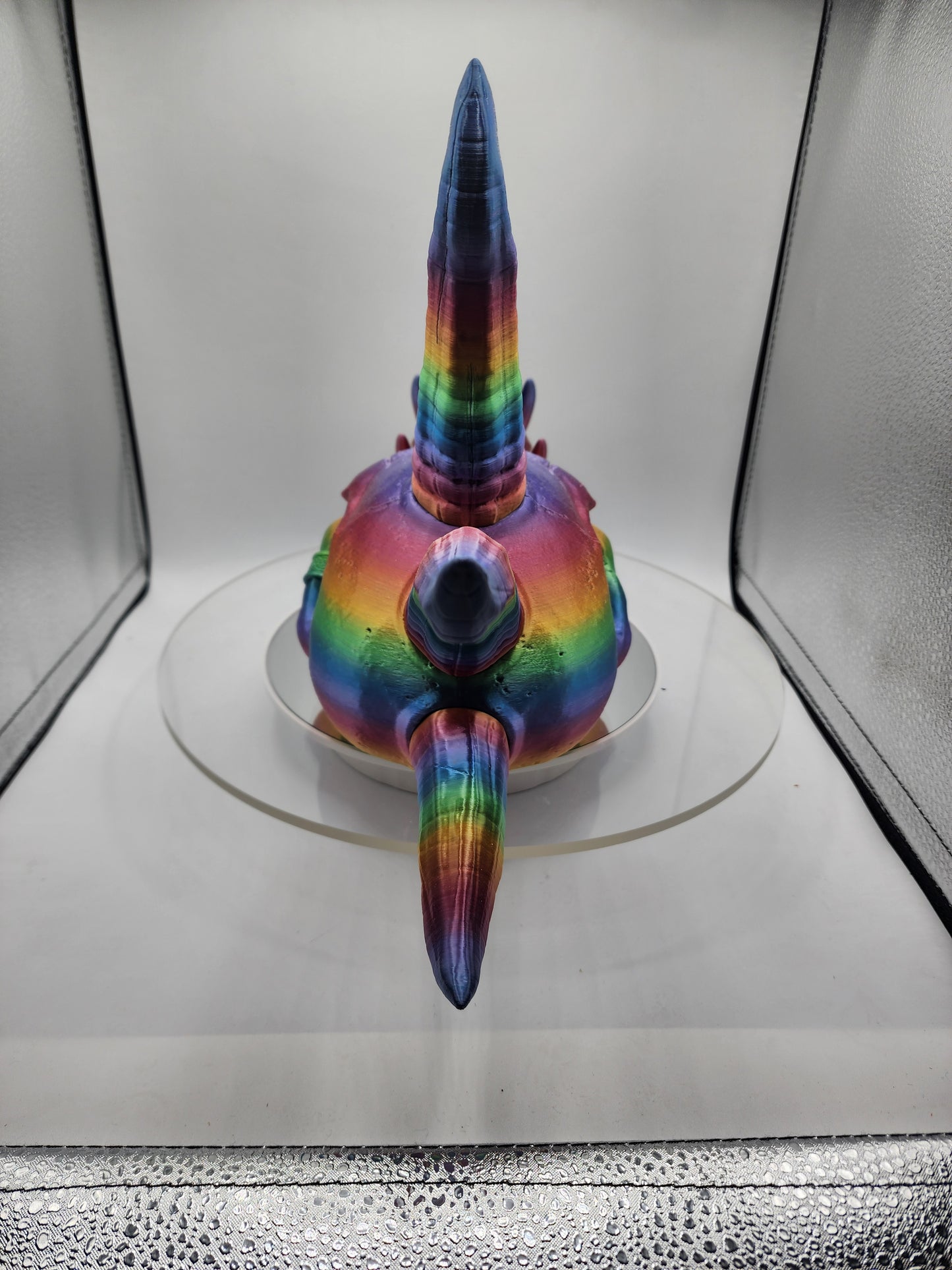 3D printed Dragon Skull printed in a rainbow filament.