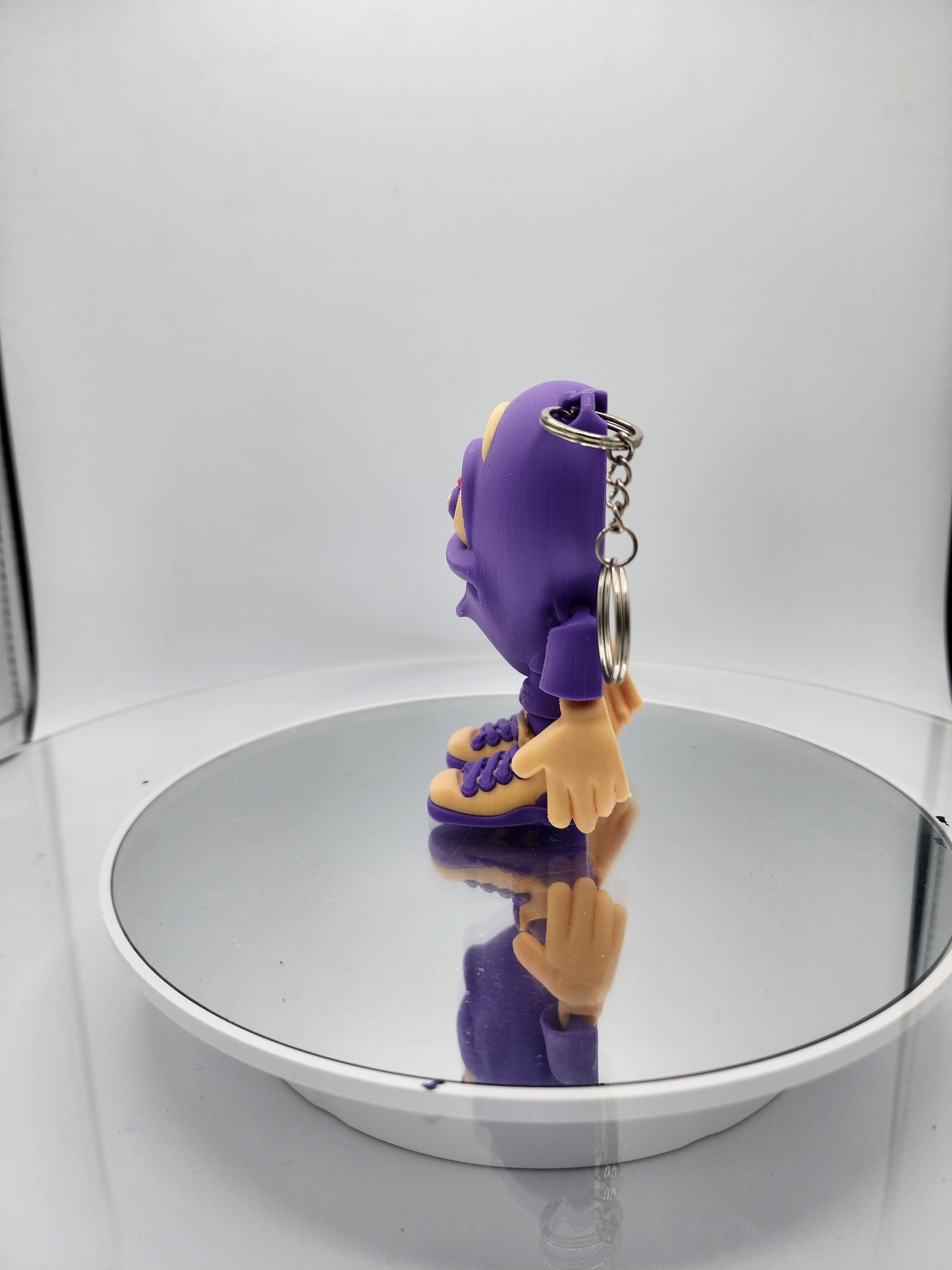 3D printed articulated Valentine's Day Herbert the Heart keychain.