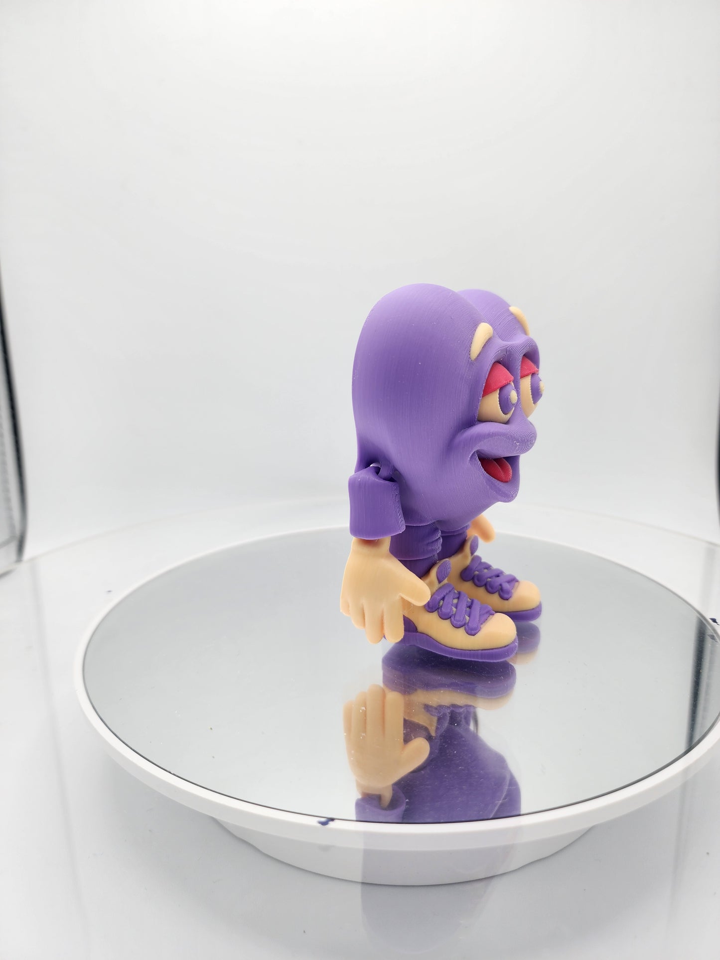 3D printed articulated Valentine's Day Herbert the Heart keychain.